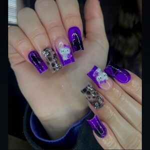 Purple and Black hello kitty Themed Nail Art